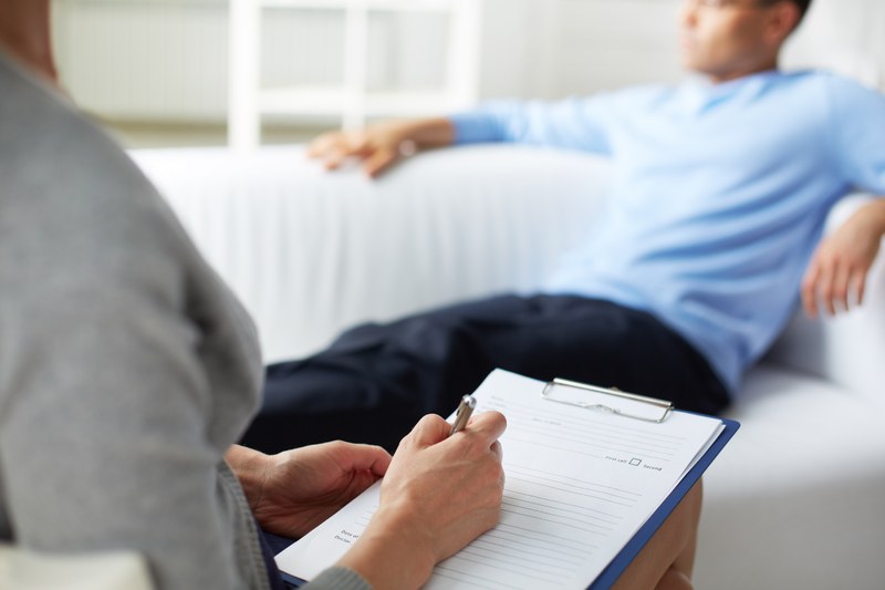 Patient sitting on the couch during psychotherapy.